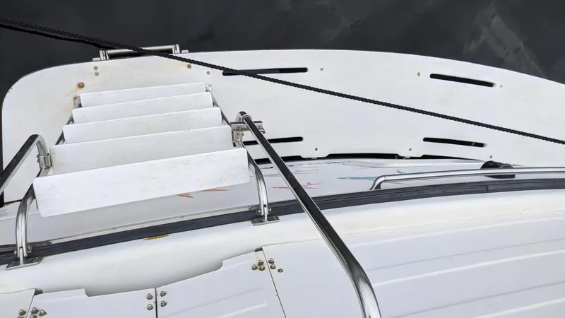 Slide: The Image of Stairs on a 1992 Jefferson 43 Sun Deck boat. - 14