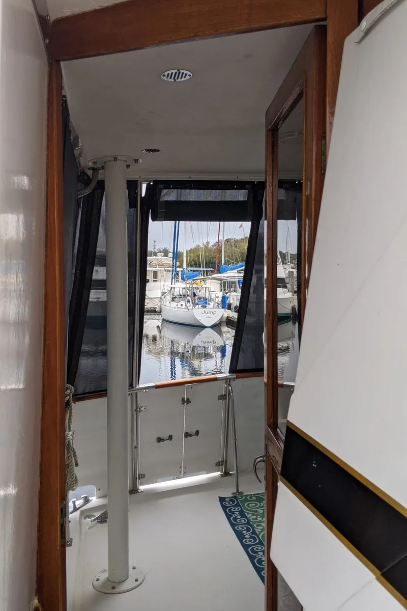 Slide: The Image of Interior view of 1992 Jefferson 43 Sun Deck yacht in marina. - 16