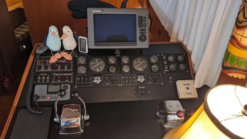 Slide: The Image of Control console of 1992 Jefferson 43 Sun Deck yacht. - 24