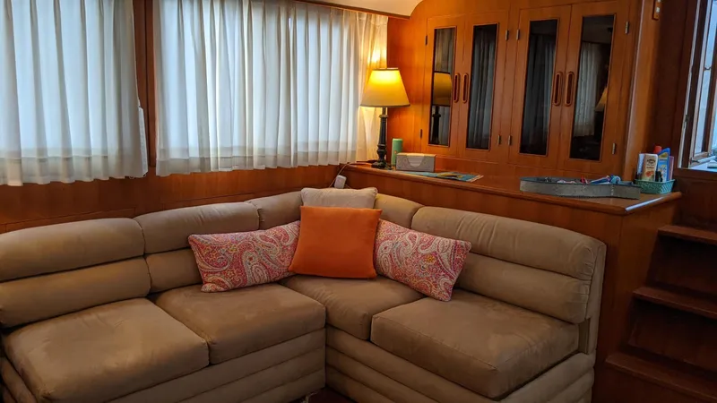 Slide: The Image of Interior of 1992 Jefferson 43 Sun Deck yacht with sofa and lamp. - 26