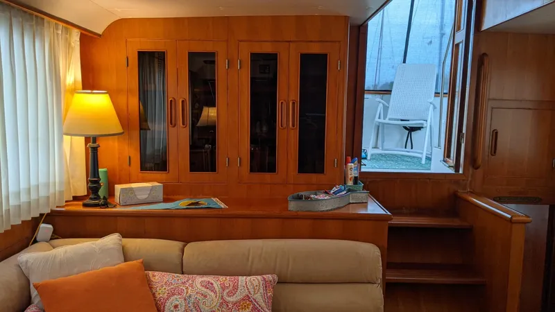 Slide: The Image of Interior of a 1992 Jefferson 43 Sun Deck yacht with wooden furnishings. - 27
