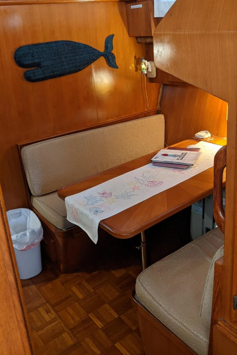 Slide: The Image of Interior of 1992 Jefferson 43 Sun Deck yacht with cozy seating area. - 35