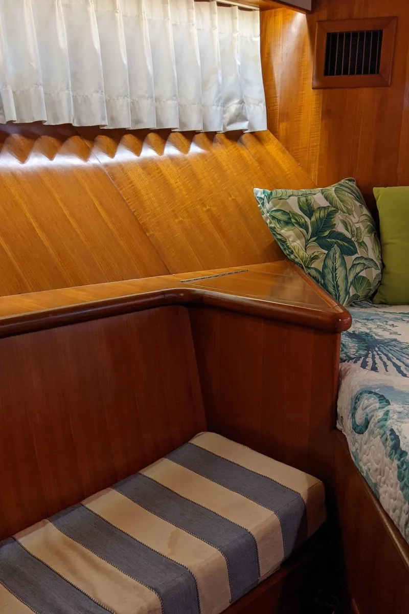 Slide: The Image of Interior of a 1992 Jefferson 43 Sun Deck yacht with wood finish. - 37