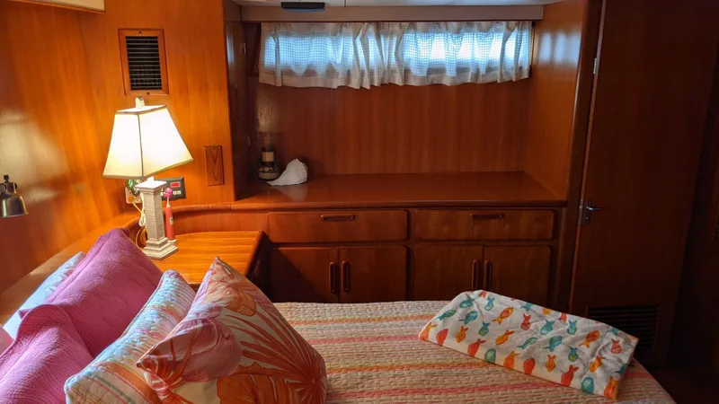Slide: The Image of Interior of a 1992 Jefferson 43 Sun Deck yacht with cozy bedroom. - 39