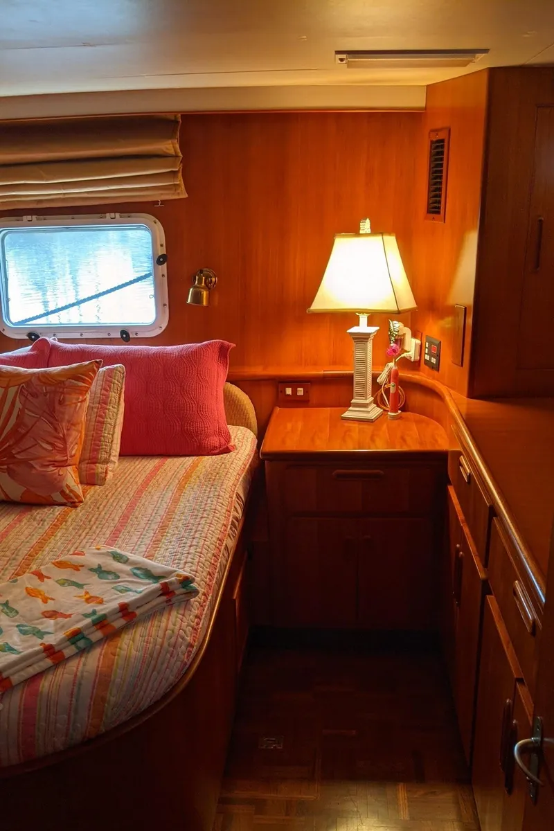 Slide: The Image of Interior of 1992 Jefferson 43 Sun Deck yacht featuring cozy bedroom. - 42