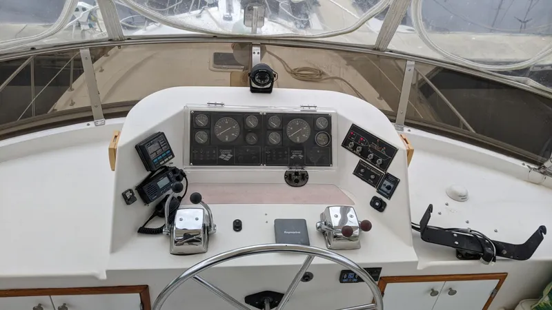 Slide: The Image of Helm of the 1992 Jefferson 43 Sun Deck yacht. - 7