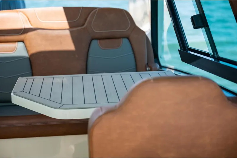 Slide: The Image of Interior seating and table of 2023 Scout 350 LXZ boat. - 49