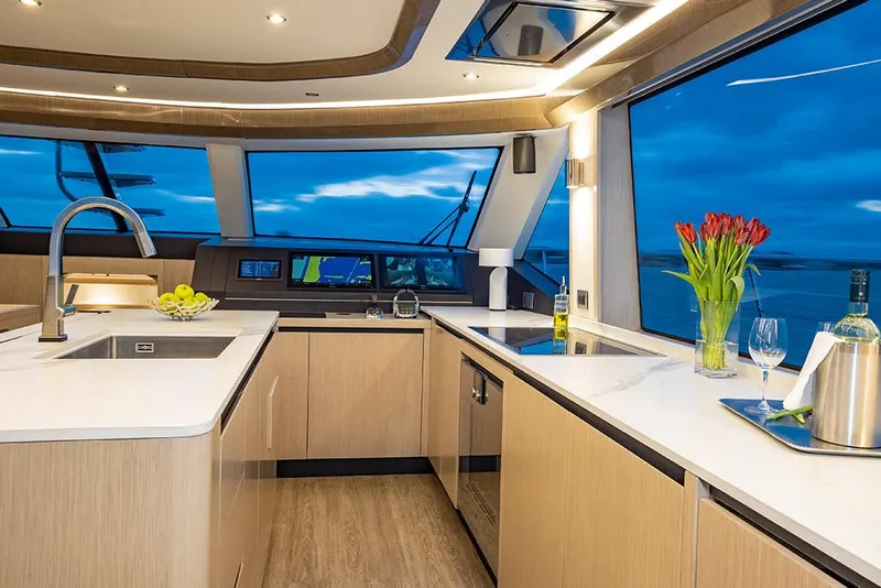 Slide: The Image of Modern kitchen interior of 2023 Aquila 70 Luxury yacht with ocean view. - 17