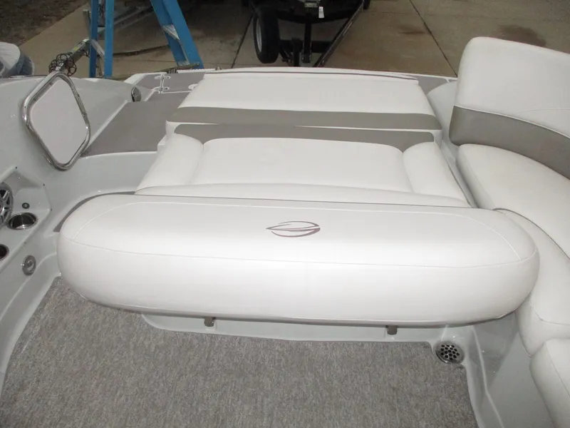 Slide: The Image of Interior of a 2015 Crownline 285 SS boat with white upholstery. - 10