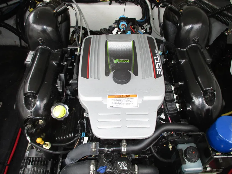 Slide: The Image of Engine compartment of a 2015 Crownline 285 SS boat with 350 HP engine. - 11