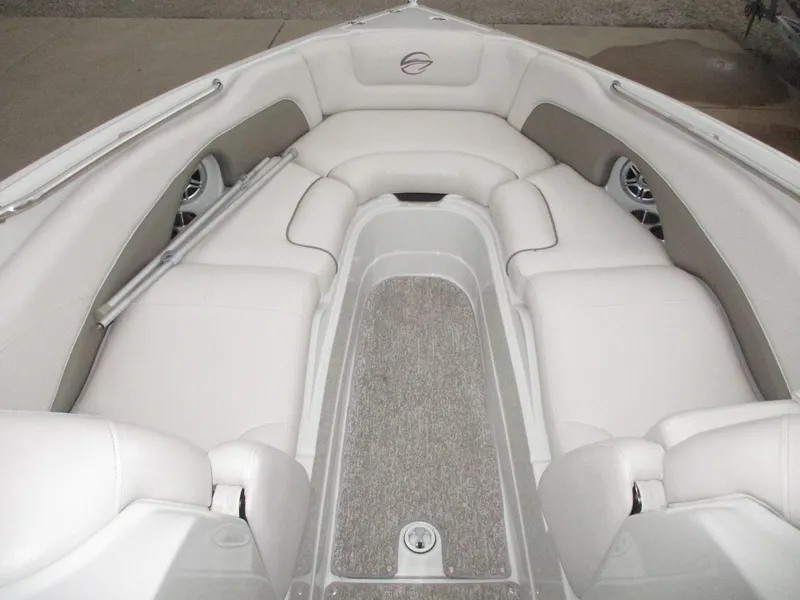 Slide: The Image of Interior of a 2015 Crownline 285 SS boat with white seating. - 7