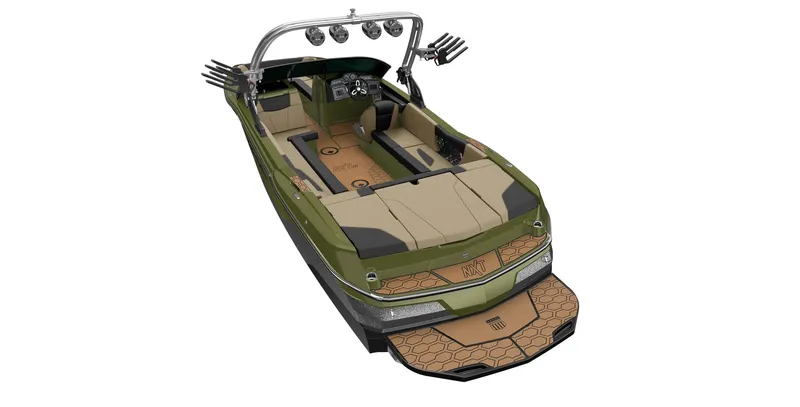 Slide: The Image of 2023 MasterCraft NXT24 boat, green and beige interior, with wakeboard tower and speakers. - 23