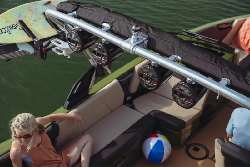 Slide: The Image of 2023 MasterCraft NXT24 boat interior with wakeboard and beach ball. - 8