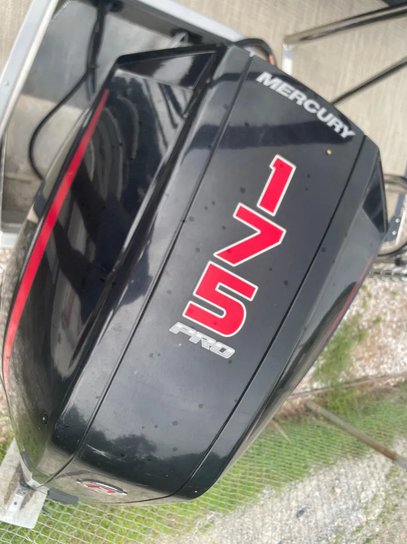Slide: The Image of Mercury 175 Pro outboard motor on 2021 Manitou 230 Aurora LE. - 13