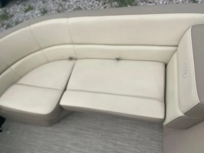 Slide: The Image of 2021 Manitou 230 Aurora LE boat interior seating. - 6
