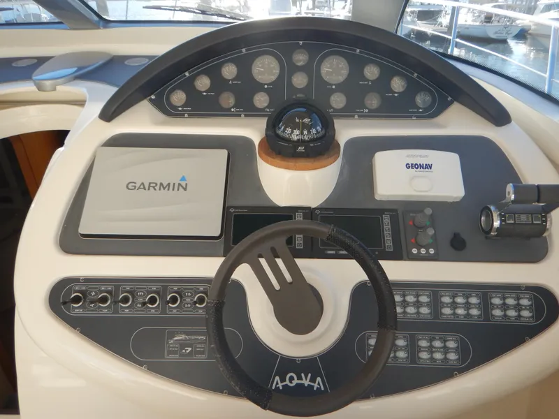 Slide: The Image of Control panel of a 2004 Baia 54 yacht with Garmin navigation system. - 23
