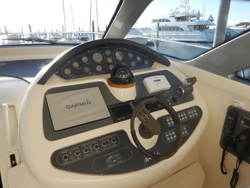 Slide: The Image of Control panel of a 2004 Baia 54 yacht with Garmin navigation system. - 24