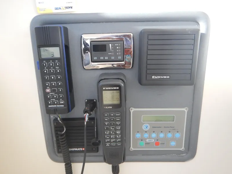 Slide: The Image of Control panel with communication devices on a 2004 Baia 54 yacht. - 25