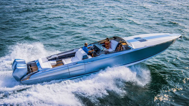 Slide: The Image of 2026 Nor-Tech 420 Monte Carlo speedboat cruising on open water. - 10