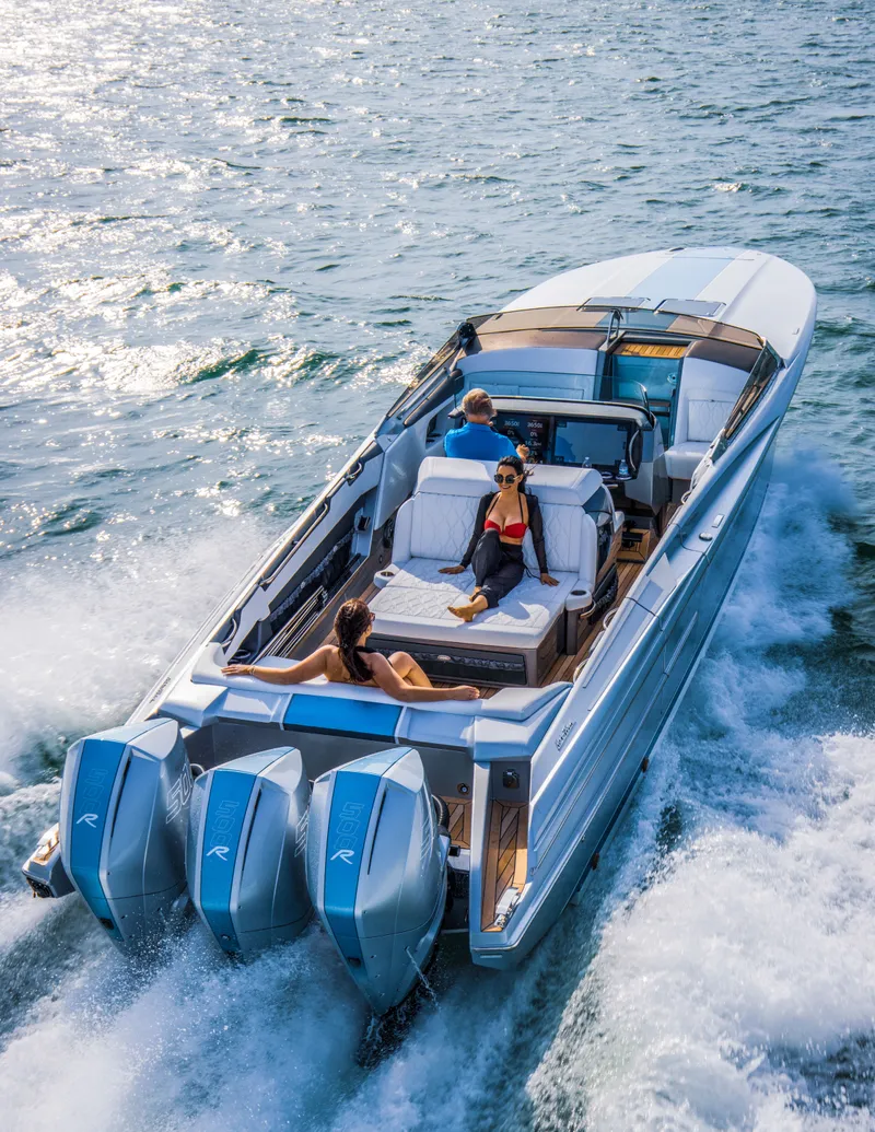 Slide: The Image of 2026 Nor-Tech 420 Monte Carlo cruising with passengers on a sunny day. - 4