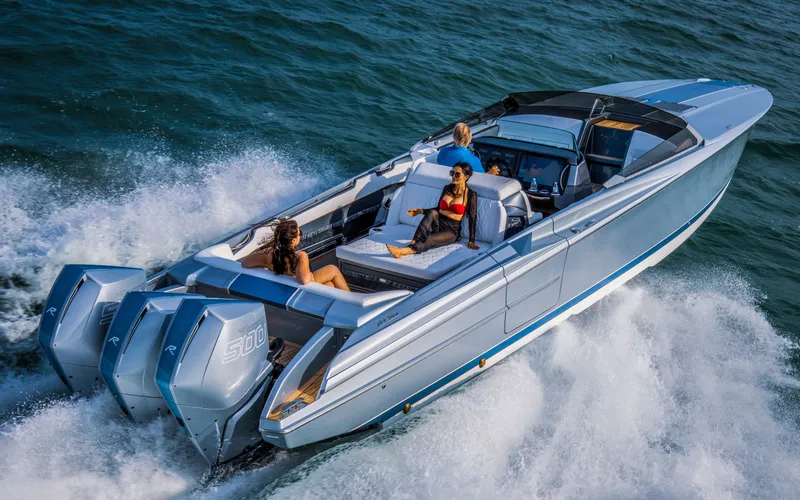Slide: The Image of 2026 Nor-Tech 420 Monte Carlo cruising on water with passengers enjoying the ride. - 5