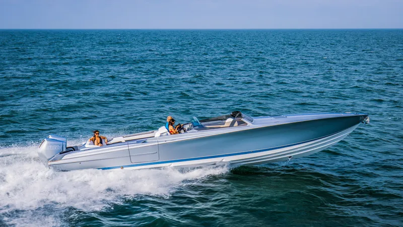 Slide: The Image of 2026 Nor-Tech 420 Monte Carlo speedboat cruising on open ocean waters. - 7