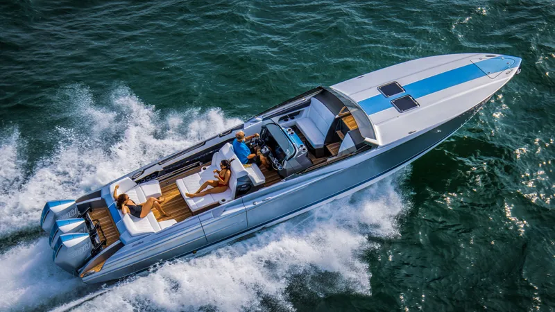 Slide: The Image of 2026 Nor-Tech 420 Monte Carlo speedboat cruising on open water, featuring sleek design and powerful engines. - 8