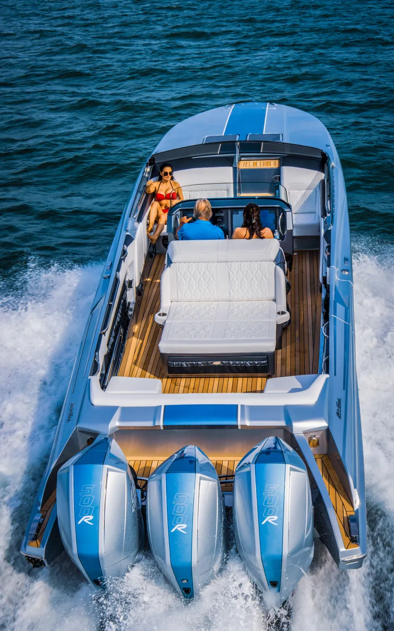 Slide: The Image of 2026 Nor-Tech 420 Monte Carlo cruising on water with three passengers. - 9