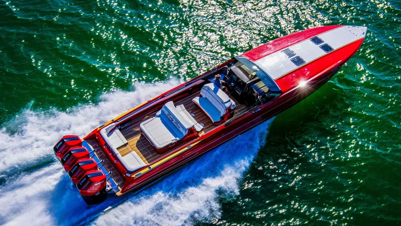 Slide: The Image of Aerial view of 2026 Nor-Tech 550 & 560 Sport Center Console boat speeding on water. - 7