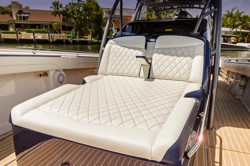 Slide: The Image of Luxurious seating on 2026 Nor-Tech 392 Super Fish boat with quilted upholstery. - 11