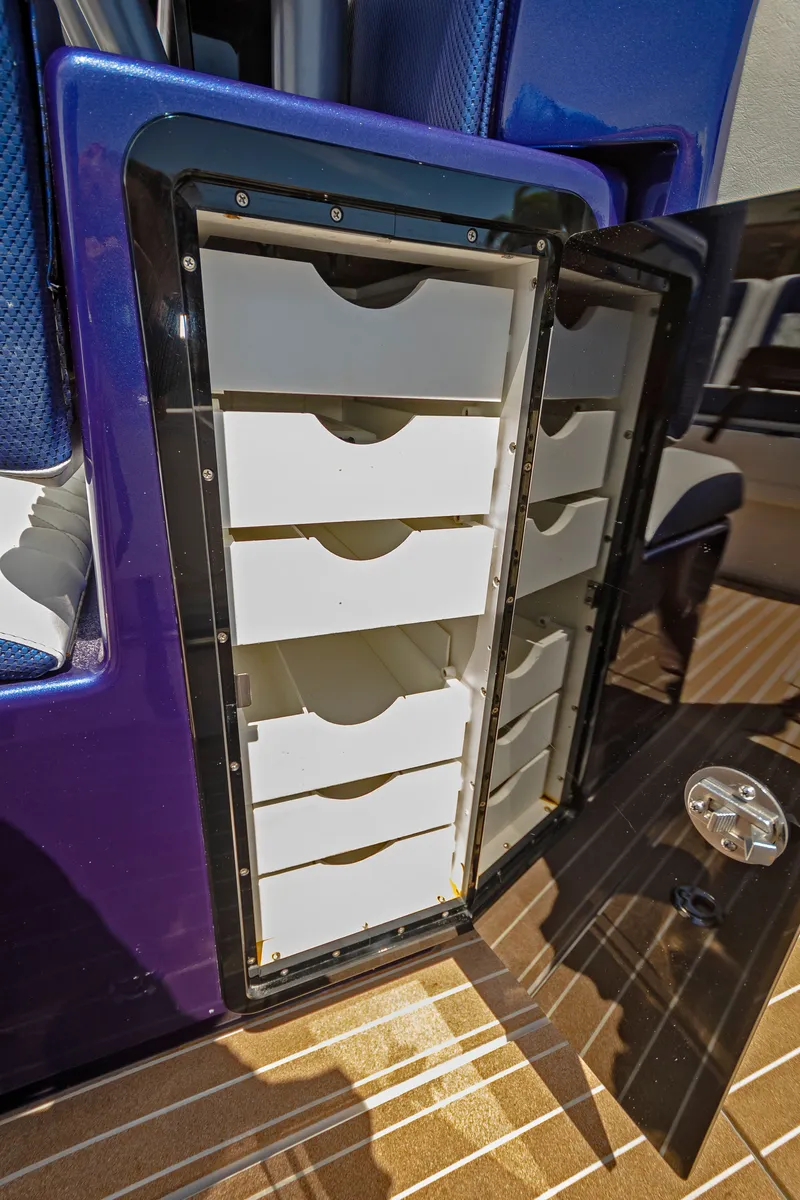 Slide: The Image of Storage drawers on a 2026 Nor-Tech 392 Super Fish boat, featuring a sleek design. - 7