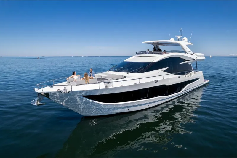 Slide: The Image of 2023 Galeon 800 Fly luxury yacht cruising on calm waters. - 1