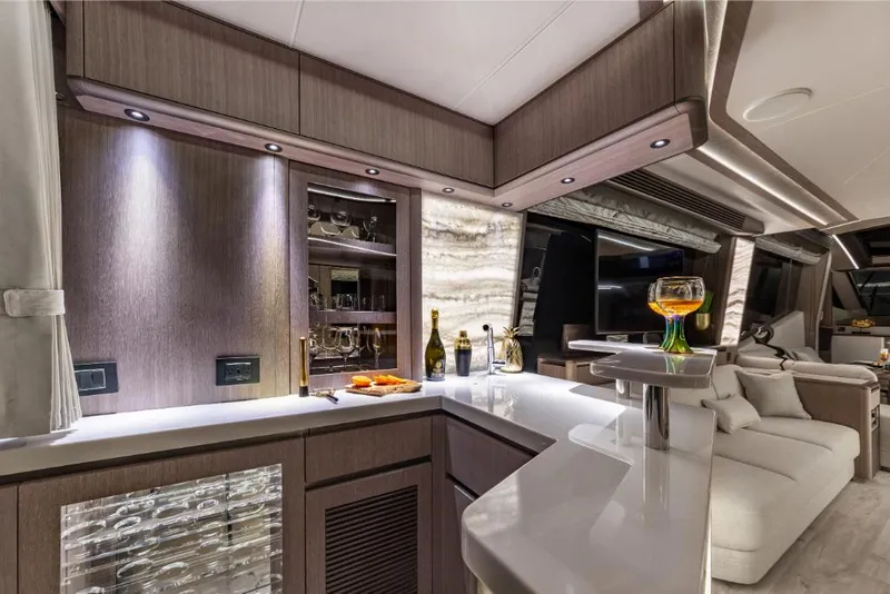Slide: The Image of Luxurious interior of 2023 Galeon 800 Fly yacht with modern kitchen and lounge area. - 16