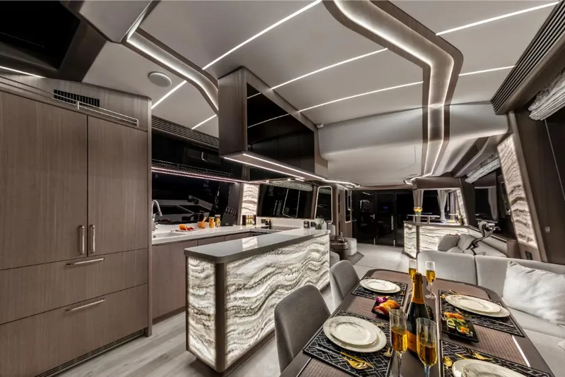 Slide: The Image of Luxurious interior of the 2023 Galeon 800 Fly yacht with modern dining area. - 23