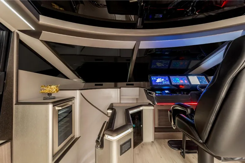 Slide: The Image of Modern helm station of the 2023 Galeon 800 Fly yacht with advanced navigation systems. - 24