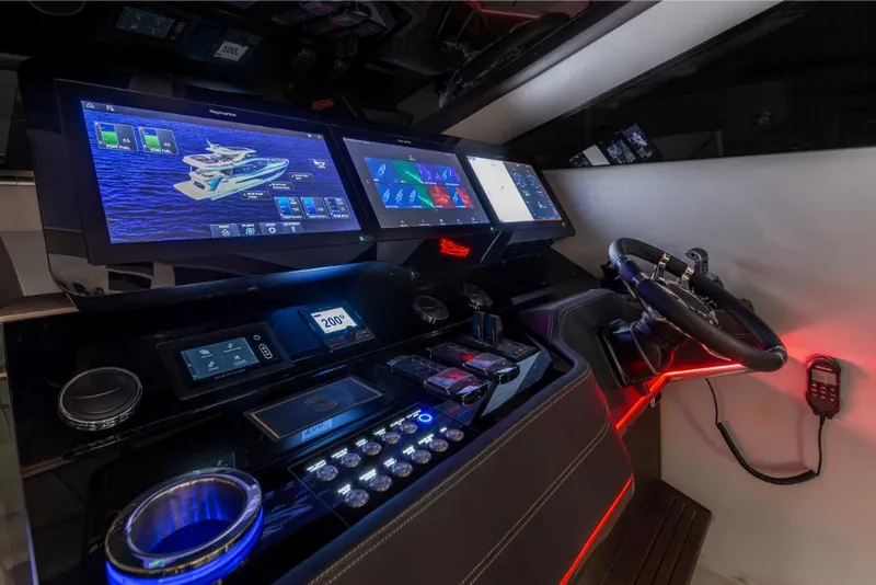 Slide: The Image of 2023 Galeon 800 Fly yacht cockpit with advanced navigation systems and modern controls. - 25