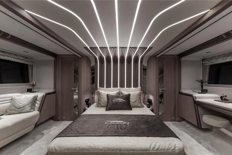 Slide: The Image of Luxurious bedroom interior of 2023 Galeon 800 Fly yacht with modern lighting and elegant design. - 27