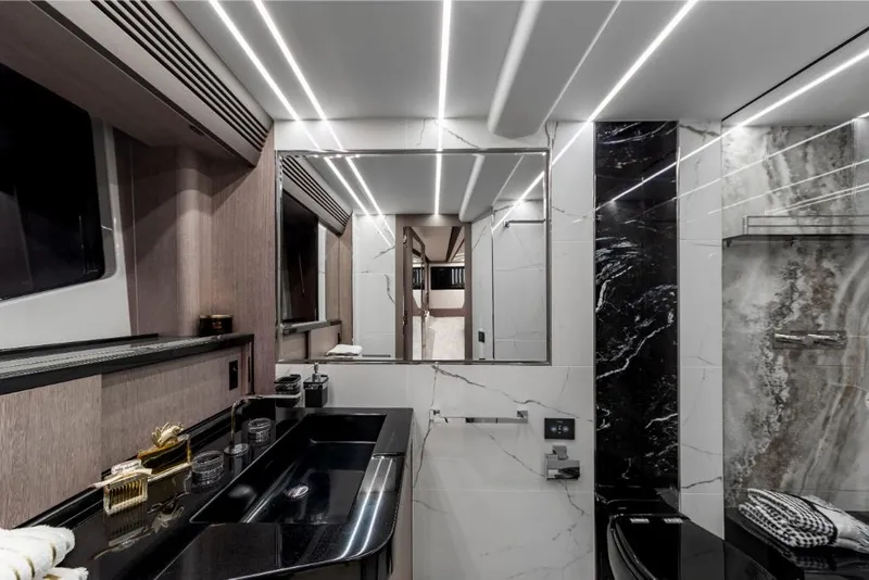 Slide: The Image of Luxurious bathroom interior of 2023 Galeon 800 Fly yacht with modern fixtures and elegant design. - 30