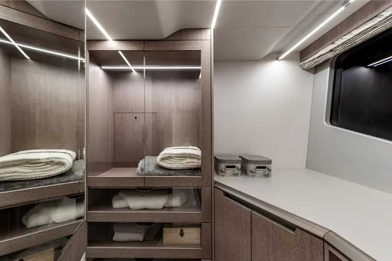 Slide: The Image of Modern interior of 2023 Galeon 800 Fly yacht with sleek cabinetry and ambient lighting. - 33