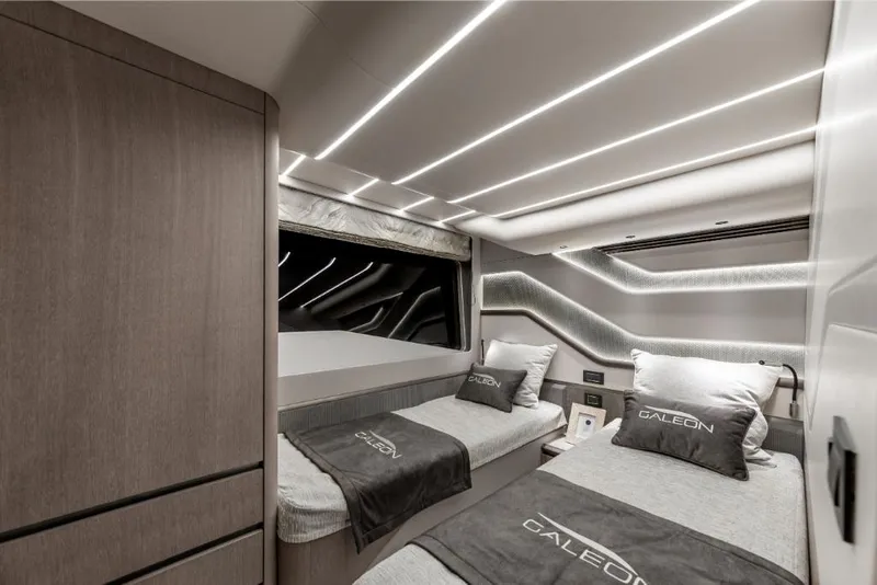 Slide: The Image of Luxurious cabin interior of the 2023 Galeon 800 Fly yacht with modern lighting. - 37