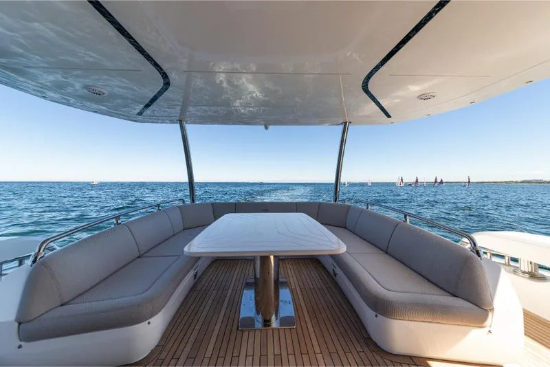 Slide: The Image of Outdoor seating area on the 2023 Galeon 800 Fly yacht with ocean view. - 46