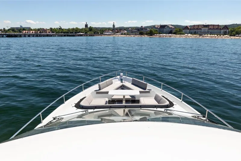 Slide: The Image of Front view of 2023 Galeon 800 Fly yacht cruising on calm waters. - 47
