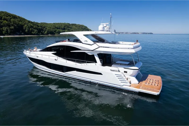 Slide: The Image of 2023 Galeon 800 Fly luxury yacht cruising on calm waters. - 8