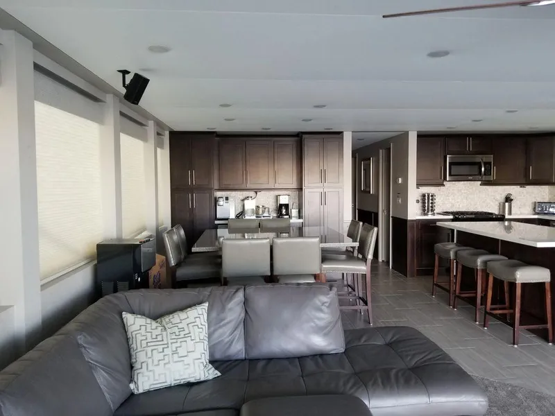 Slide: The Image of Modern kitchen and living area in 2016 Bravada Epic Journey houseboat. - 10