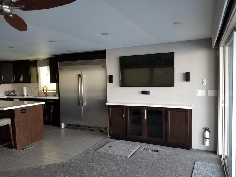 Slide: The Image of Modern kitchen and living area in 2016 Bravada Epic Journey houseboat. - 7