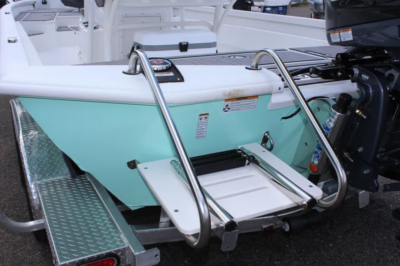 Slide: The Image of 2023 Avid AVID 23 MAG boat stern with swim ladder and outboard motor. - 8