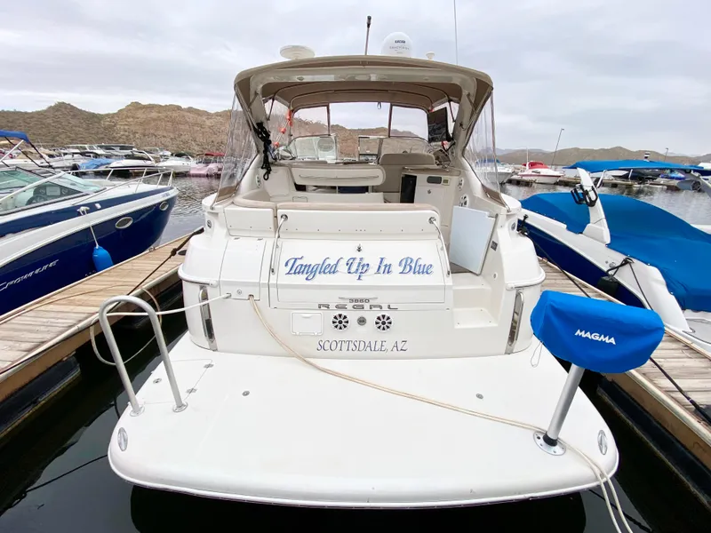 Slide: The Image of 2002 Regal 3860 Commodore yacht docked, named "Tangled Up In Blue," Scottsdale, AZ. - 1