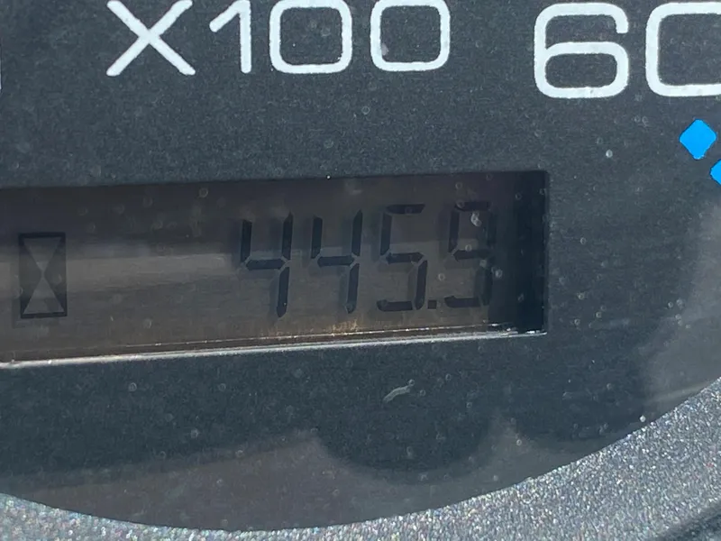 Slide: The Image of Close-up of a 2002 Regal 3860 Commodore tachometer displaying 445.9 hours. - 39