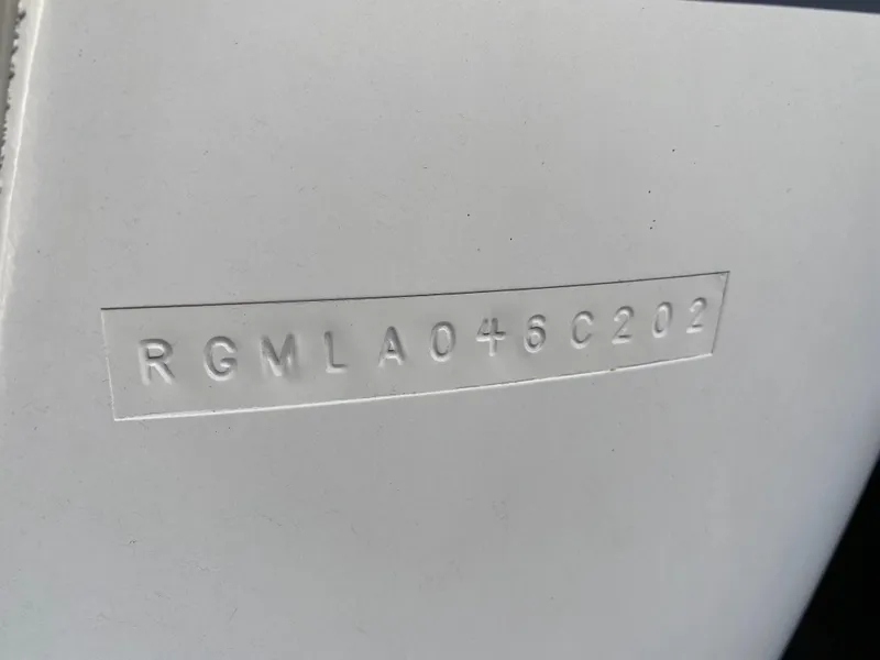 Slide: The Image of Hull identification number on 2002 Regal 3860 Commodore boat. - 41