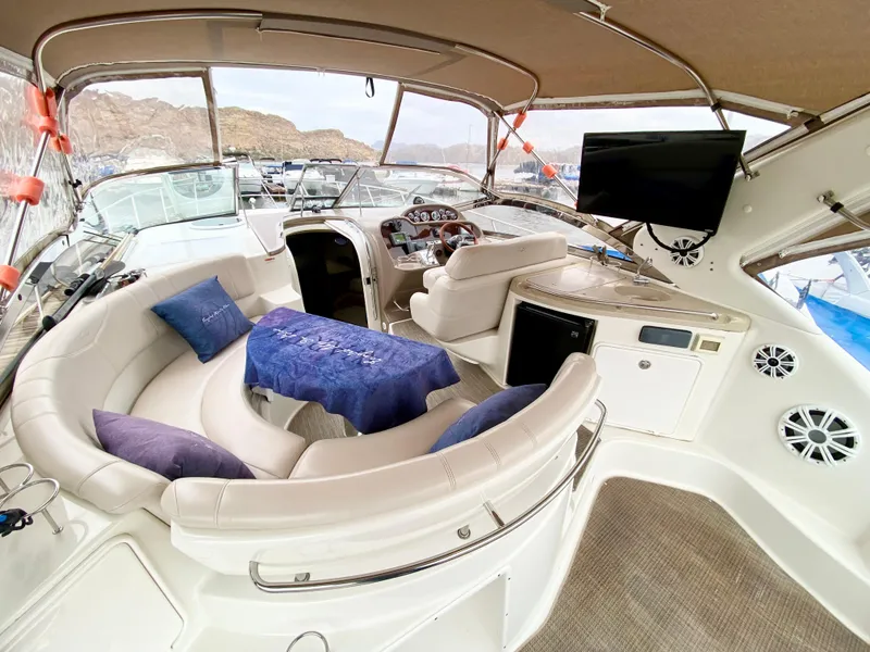 Slide: The Image of Luxurious 2002 Regal 3860 Commodore yacht interior with plush seating and modern amenities. - 5